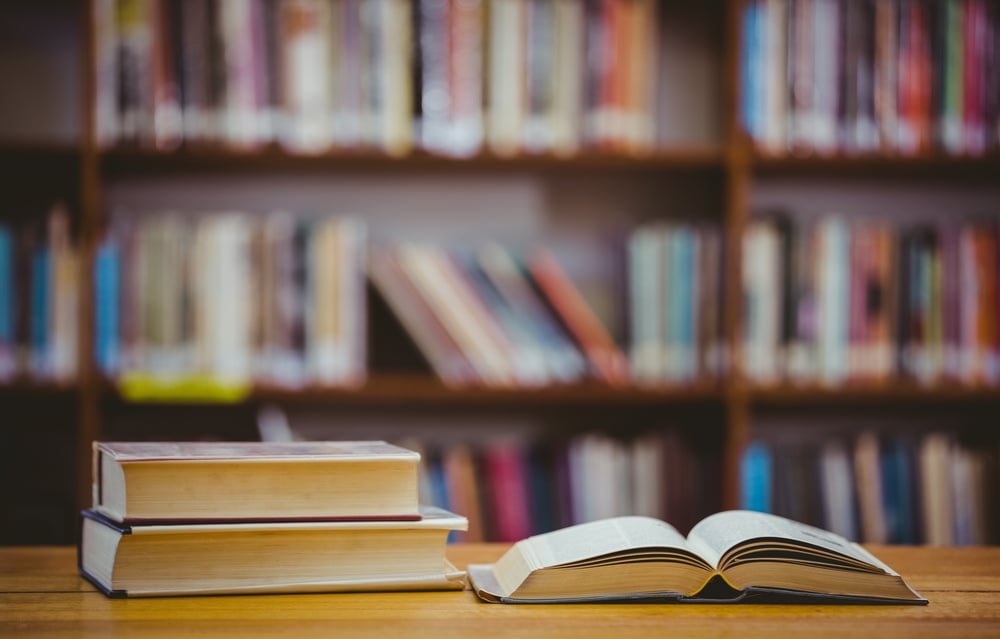 Books on desk symbolizing free legal resources.