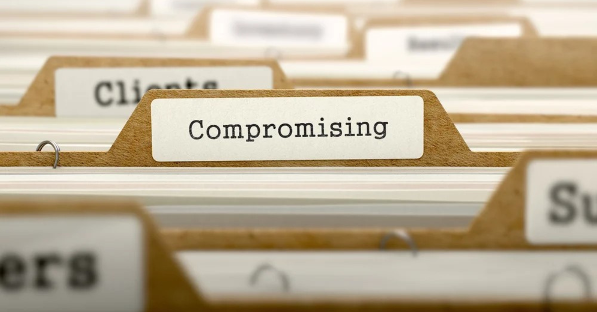 File tab labeled 'Compromising' in focus, symbolizing what mediation is; a compromise to resolve legal disputes without court involvement.